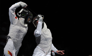 Illustration for article titled The Tech Inside Olympic Fencers' Amazing Future-Warrior LED Helmets
